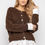 Miniatura: Hnědý pletený svetr s košilovými lemy
