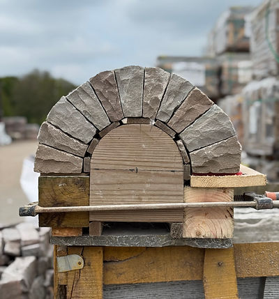 Lunkey stone arch ready to install within a dry stone wall at Chelsea Flower Show