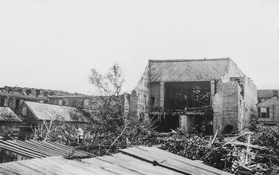 The Hodge Building on Main Street. The back of the building was torn off by the storm, exposing the Vaudeville Theater. The theater’s grand opening was scheduled for the day the storm arrived. Source: George H. & Laura E. Brown Library, Washington, NC.