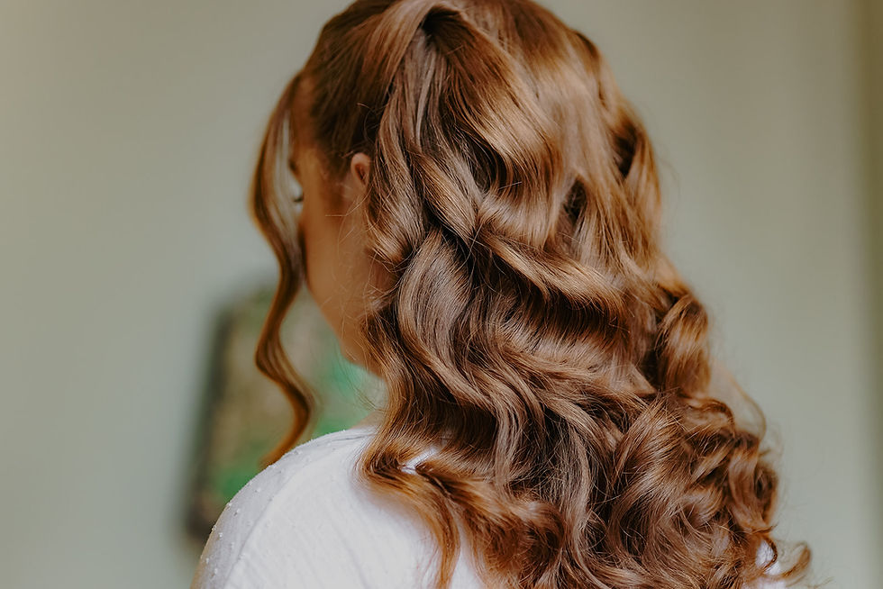 a bride with stunning auburn waves on her wedding morning in Yorkshire