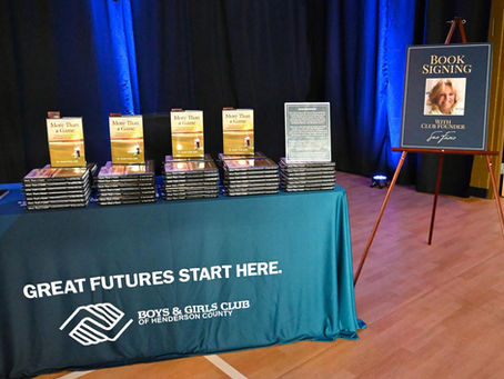 More Than a Game Book Signing Table Set Up