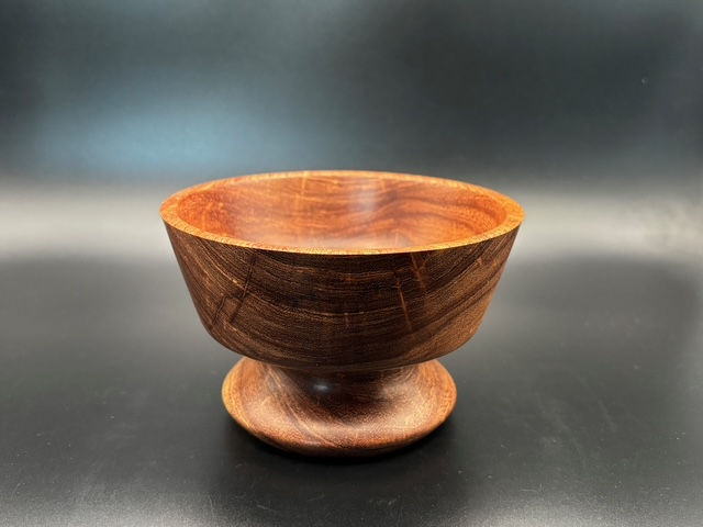 Thumbnail: Texas Mesquite pedestal bowl features stunning natural grain lines that make it a truly eye-catching piece.