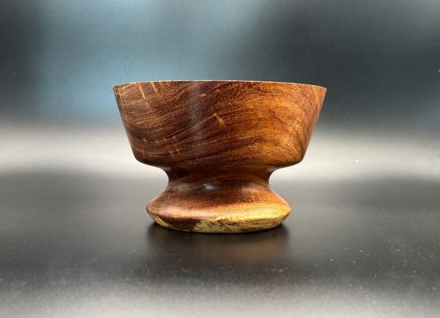 Thumbnail: Texas Mesquite pedestal bowl features stunning natural grain lines that make it a truly eye-catching piece.