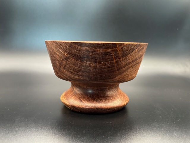 Thumbnail: Texas Mesquite pedestal bowl features stunning natural grain lines that make it a truly eye-catching piece.