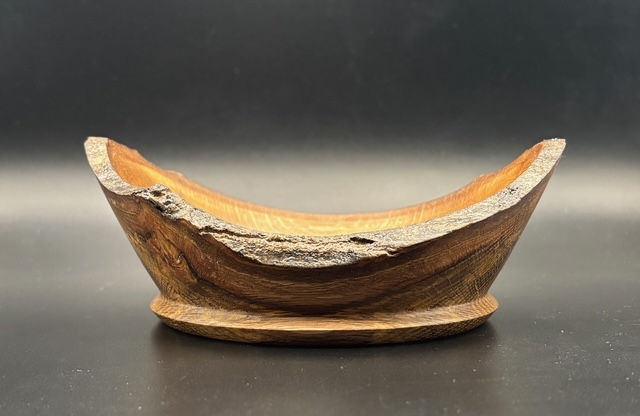 Thumbnail: Rustic charm meets refined craftsmanship in this Red Oak bowl. Carefully handcrafted to highlight the wood’s natural beauty