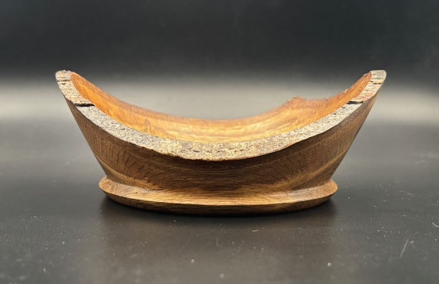 Thumbnail: Rustic charm meets refined craftsmanship in this Red Oak bowl. Carefully handcrafted to highlight the wood’s natural beauty