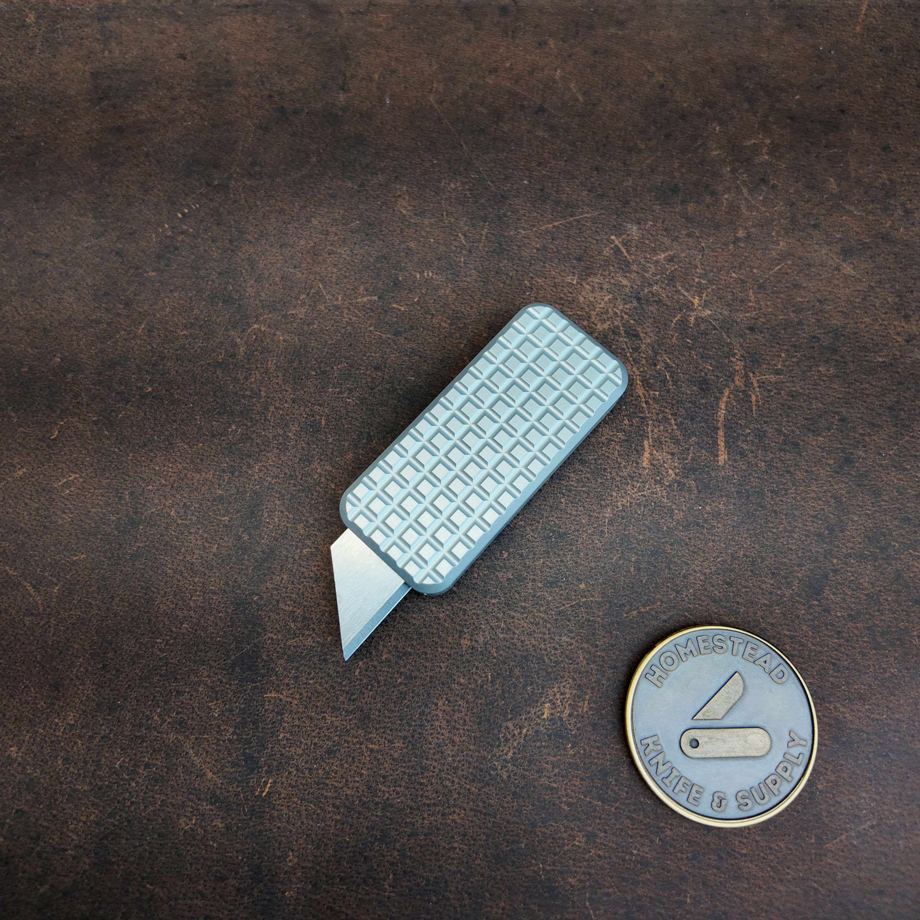 Rivery Zero | Grenade Pattern | 6061 Aluminum with lanyard hole
