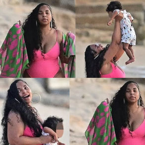 Ashanti shows off her hourglass curves in cheeky swimsuit while soaking up the sun on the beach in Barbados