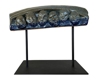 The Boat ceramic sculpture by Vivian Gutierrez depicting figures migrating in a boat