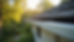 Eye-level view of a clean gutter guard installed on a Port Macquarie home roofline