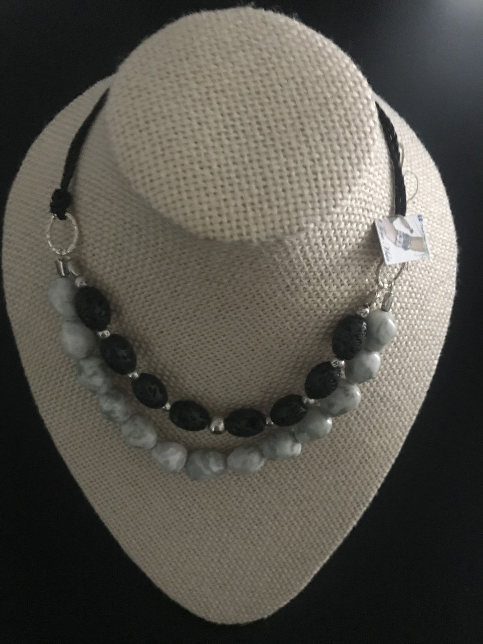 Beautiful two-lines handmade necklace with Volcano and agate stones and leather