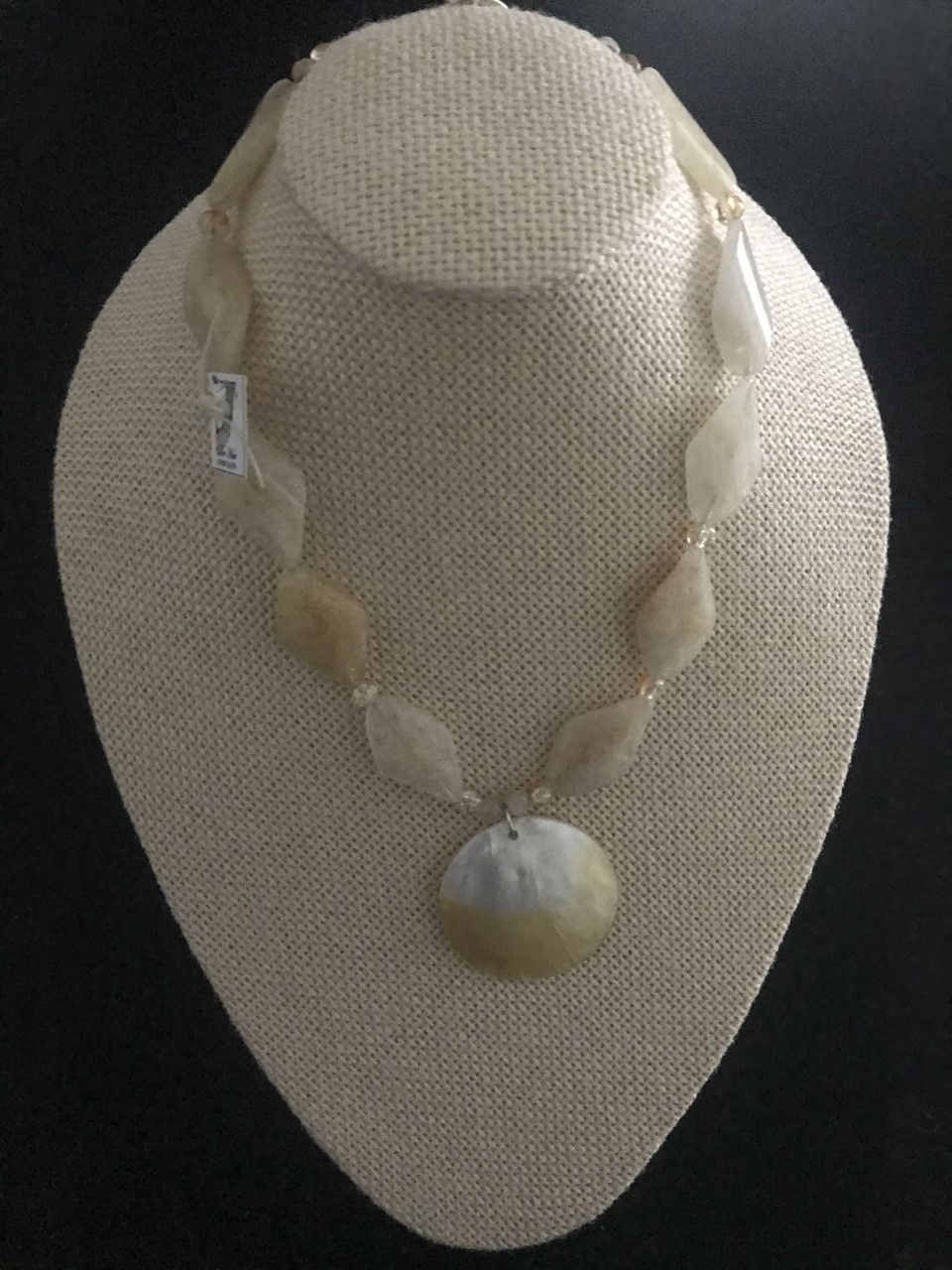 Great and beautiful necklace with Citrine stones and a Shell pendant