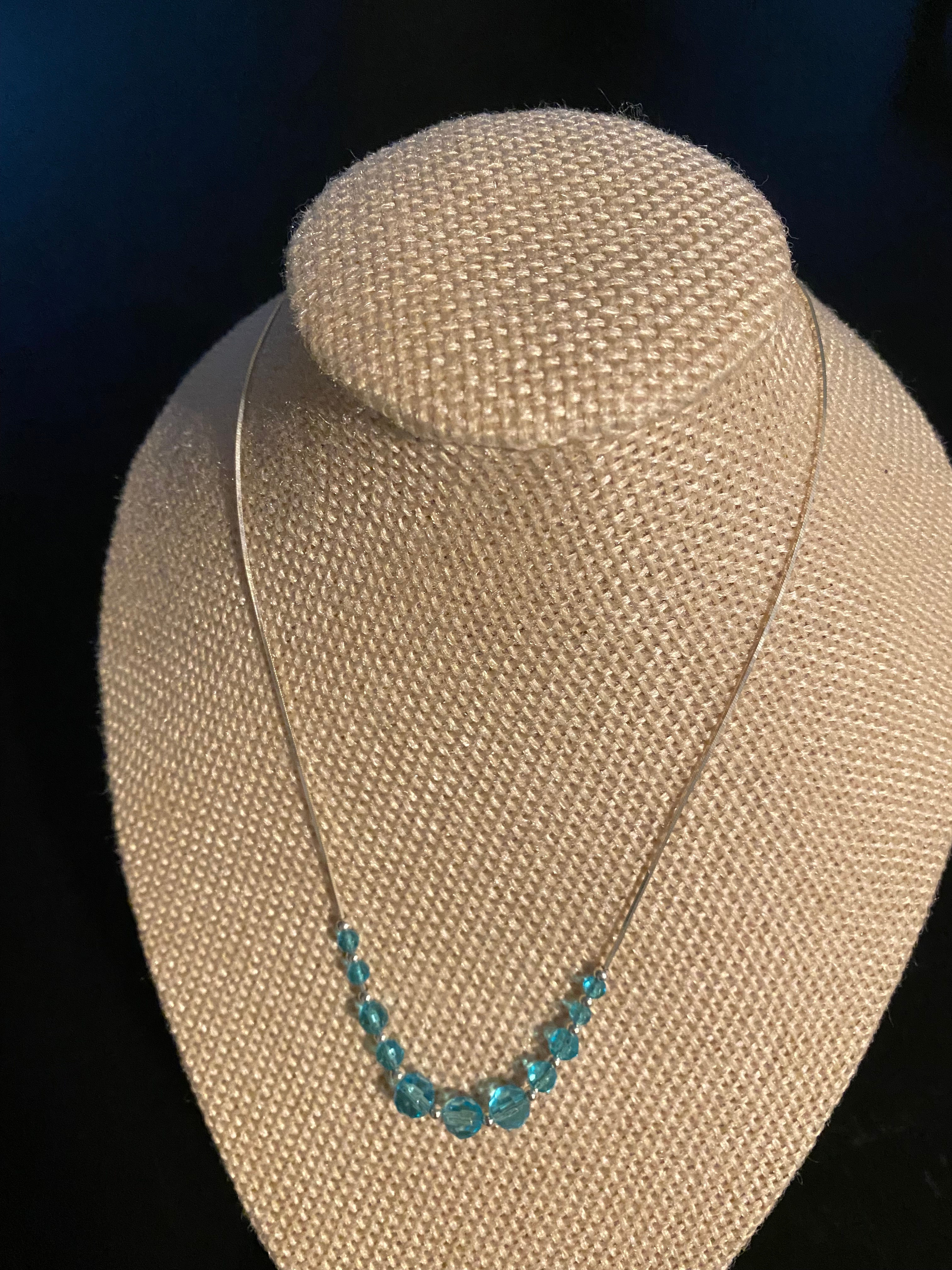 Silver 9.25 Petit Necklace with Blue Crystals.