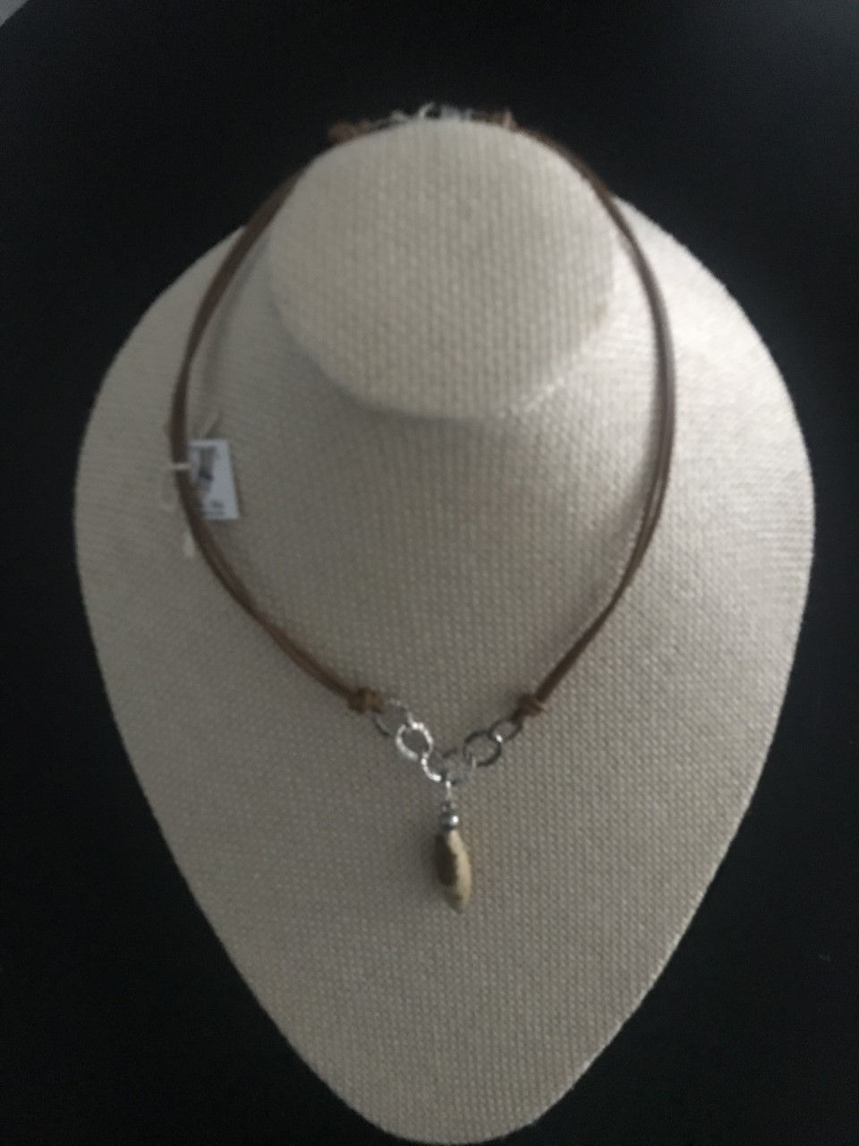 Delicate necklace with Jasper stone pendant and Silver pieces in leather