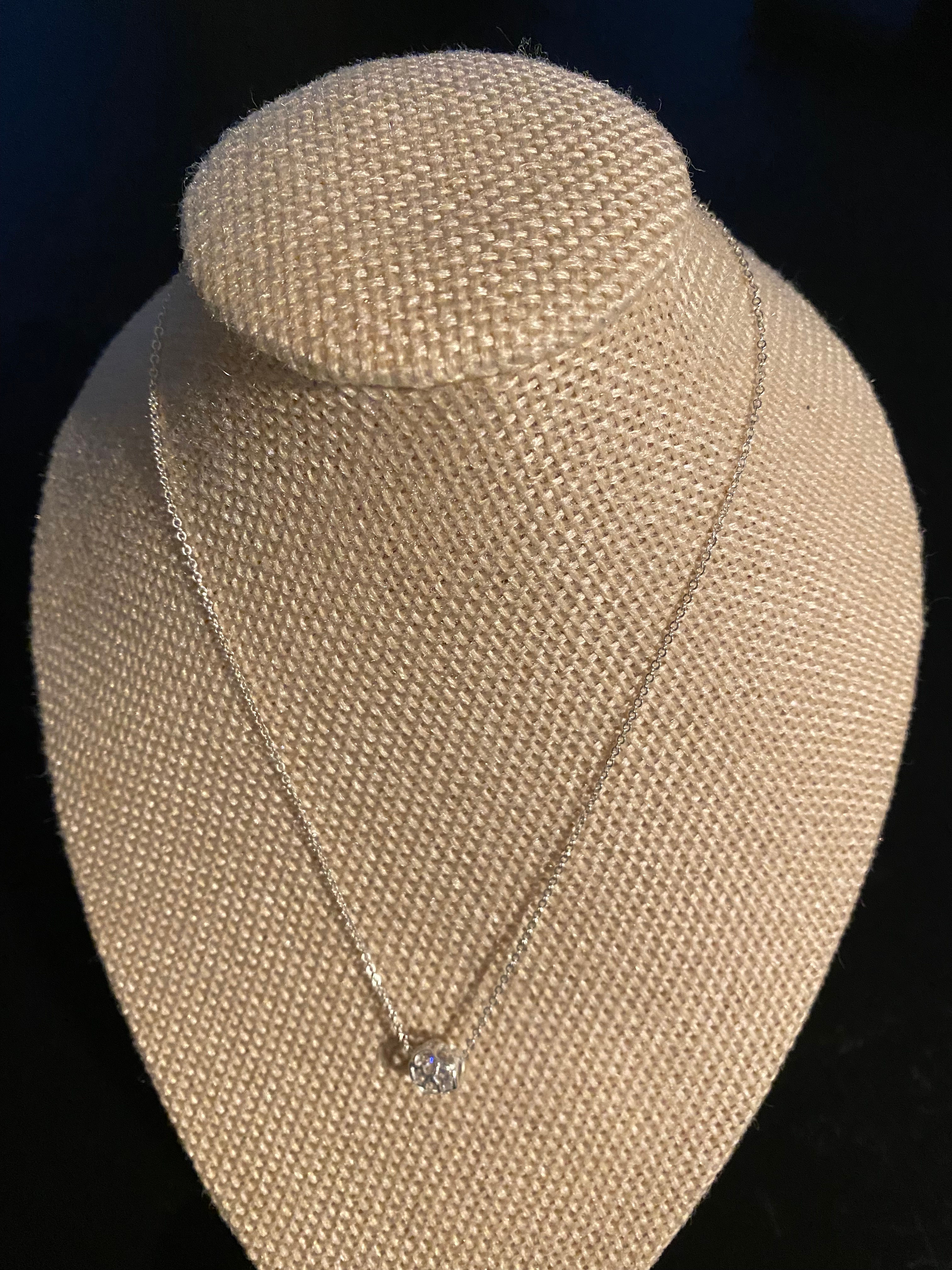 Silver 9.25 Necklace with a small Silver 9.25 pendant.