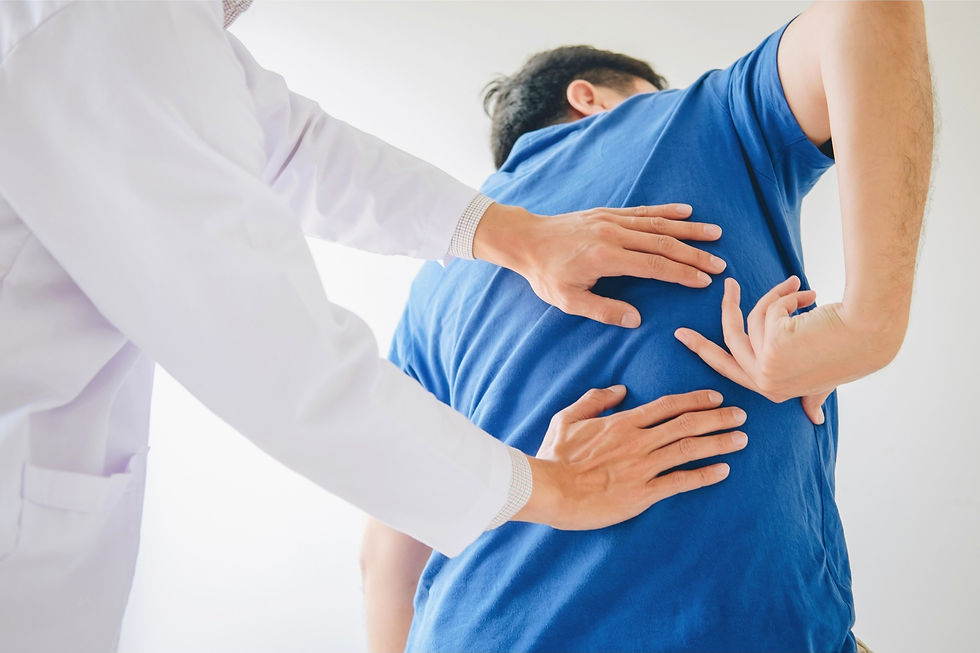 TCM practitioner examining patient's back