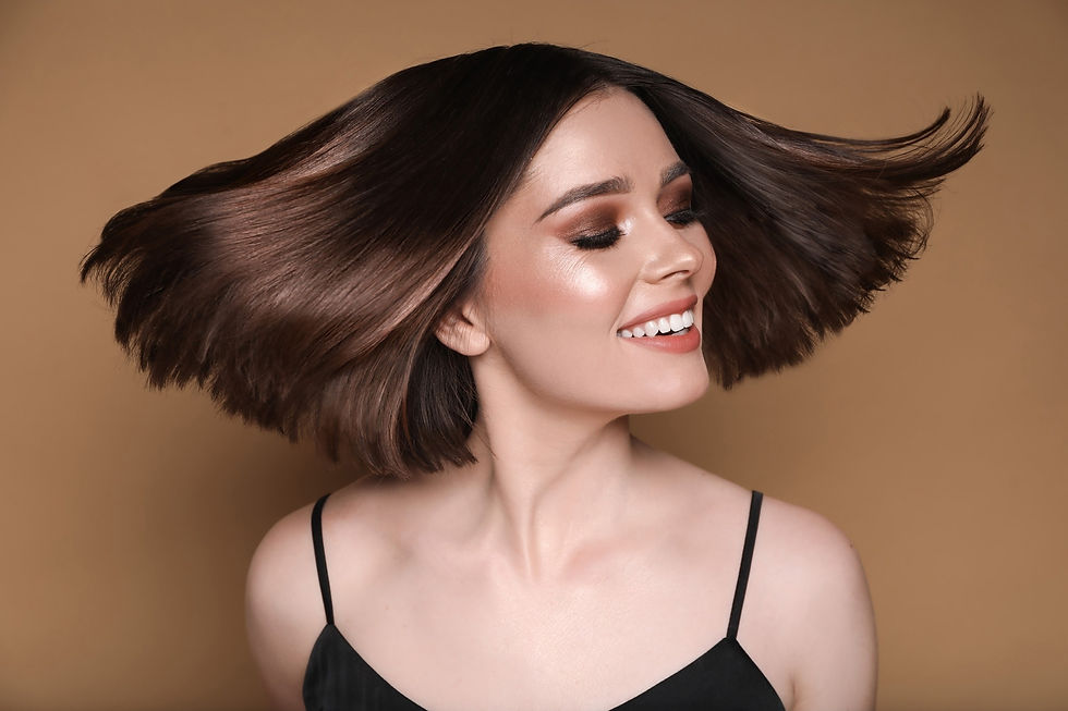 Smiling woman with healthy, shiny hair from Herbal Scalp Therapy