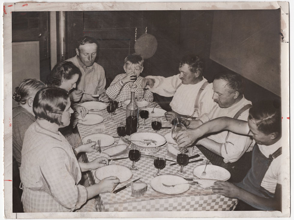 Wine dominates the table of this typical French family