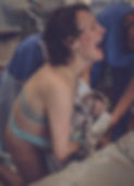Woman giving birth