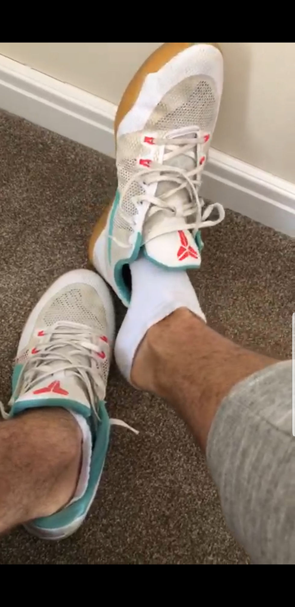 Tony removes his shoes, socks, and reveals his size 15 US feet