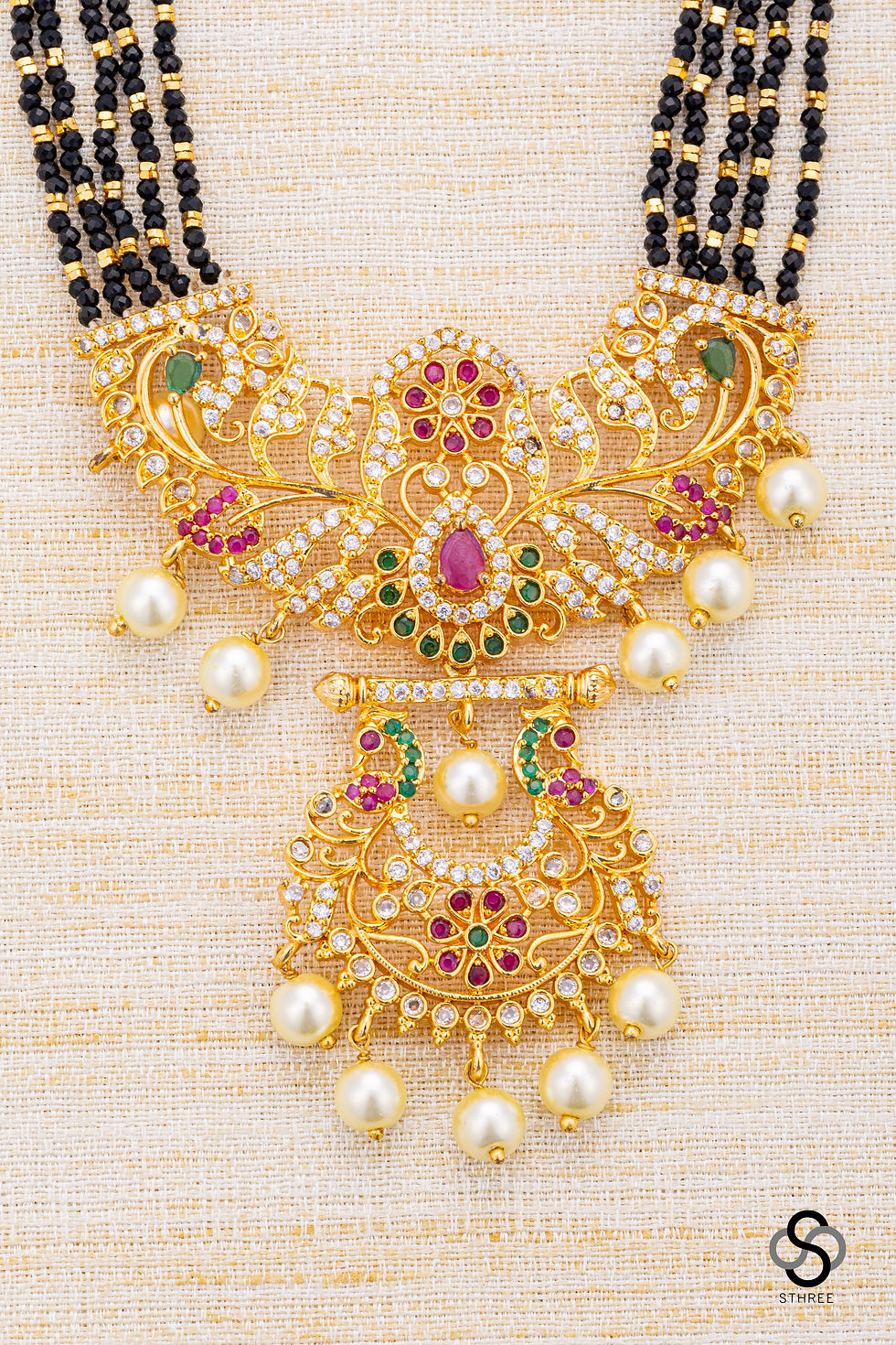 Thumbnail: Karugamani with Kemp pendant