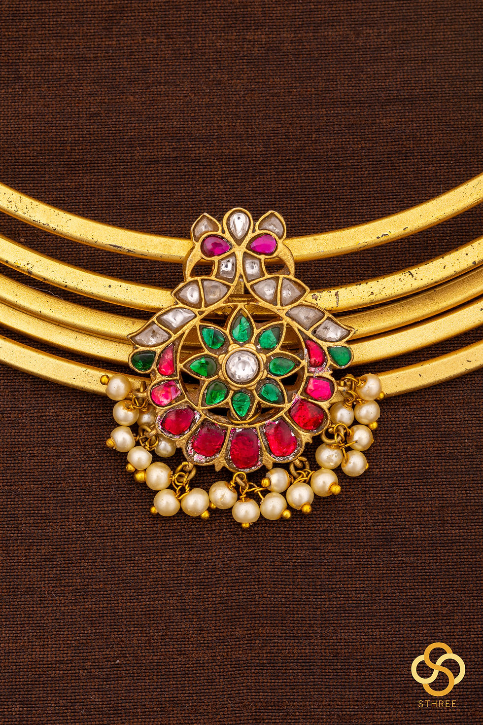 Thumbnail: Hasli with jadau kundan with a red chandbali centrepiece