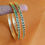 Thumbnail: Mini emerald green stone bangles in Aympon