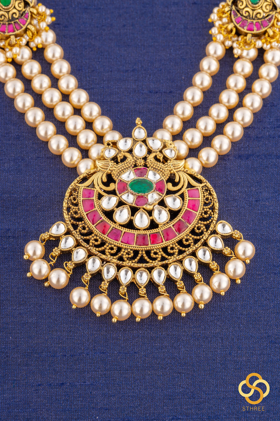 Thumbnail: Swarovski three-liner pearls with a chandbali pendant and mogappu