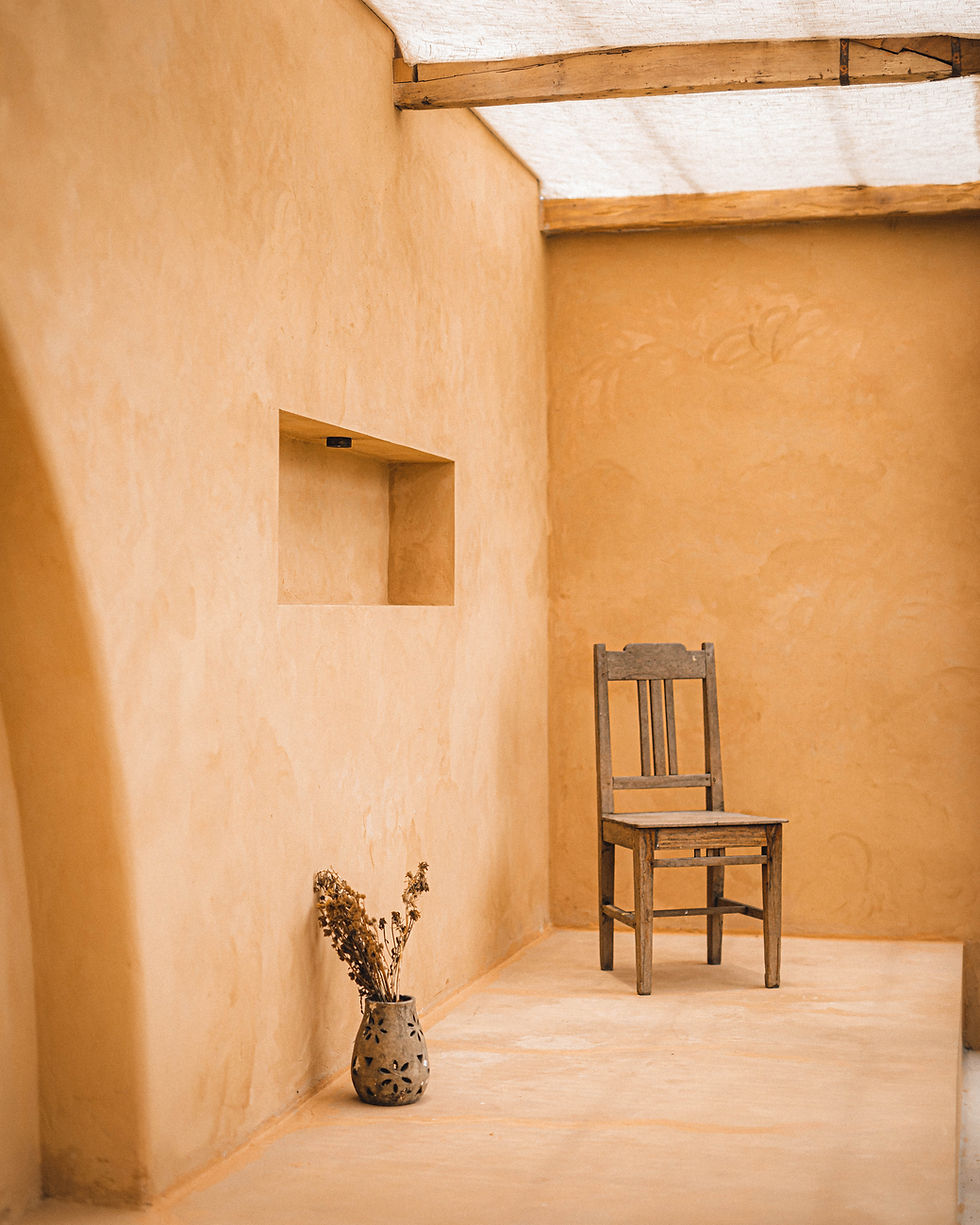 empty-chair-table-against-wall-home.jpg