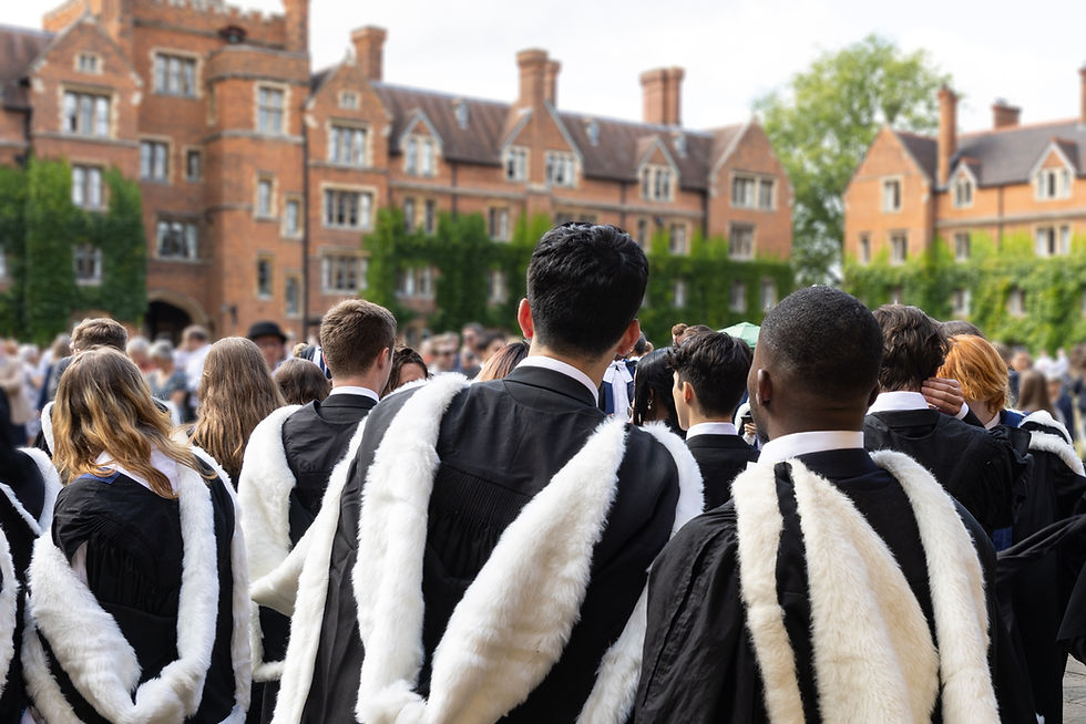 back view of Male and female fresh graduate international British Black African students w