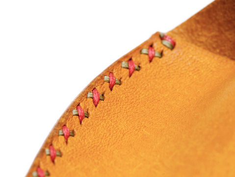 Made with BADALASSI CARLO Pueble leather Hand-Cross-Stitched, in the front side of the case, using durable UV-resistant German waxed threads.