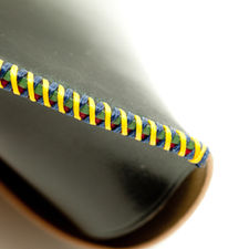 Made with HORWEEN Black Shell Cordovan hand-cross-stitched with 4 color durable UV-resistant German threads - 2 colors on each side.