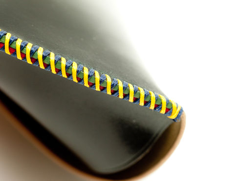 Made with HORWEEN Black Shell Cordovan hand-cross-stitched with 4 color durable UV-resistant German threads - 2 colors on each side.