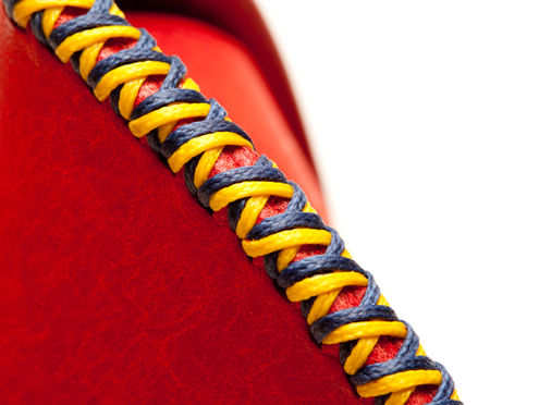 Hand-Double-Cross-Stitched using durable UV-resistant German waxed threads.