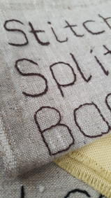 hand stitched words on fabric