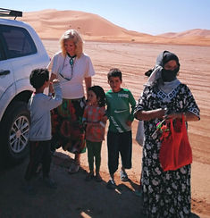 Judy with Mother & Children in the Sahara Desert, Morocco