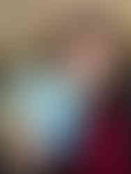 Kyla holding "The Big Catch," a children's book about fishing