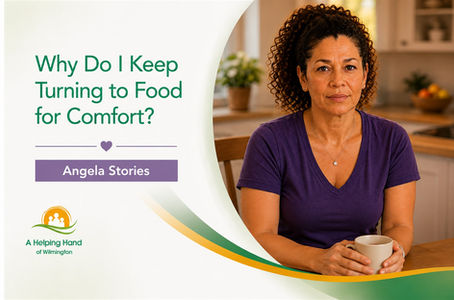 Woman sitting at a kitchen table for a mental health story about turning to food for comfort and emotional eating.
