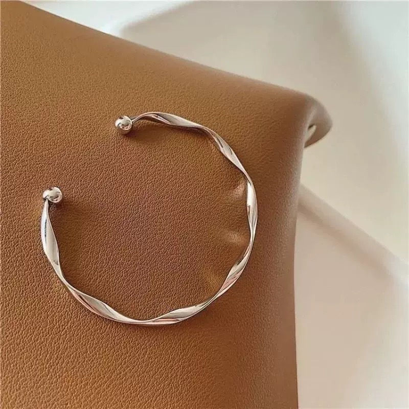 Thumbnail: Open Twist Smooth Metal Bracelet