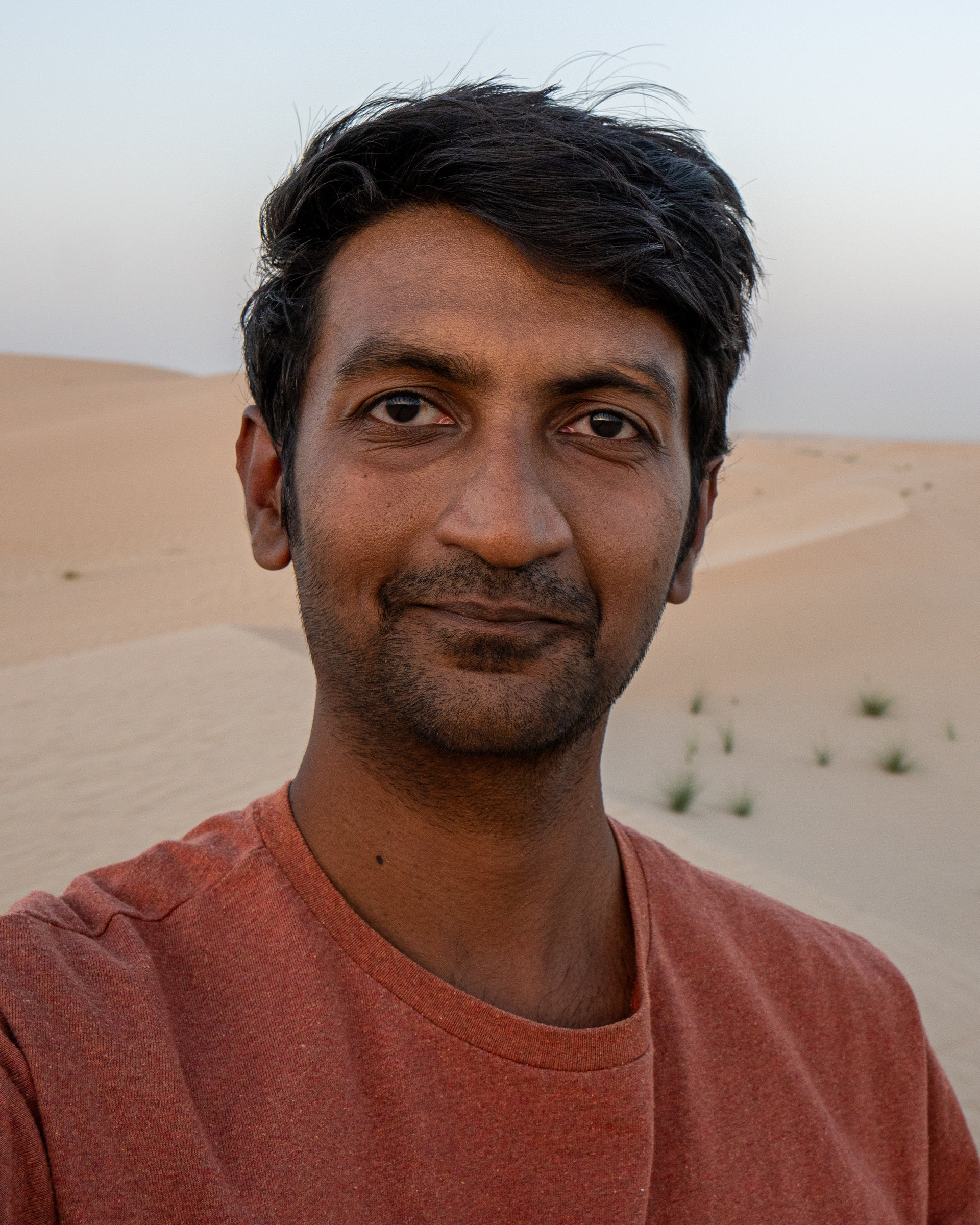 Arvind Premanand in the desert dunes at dusk