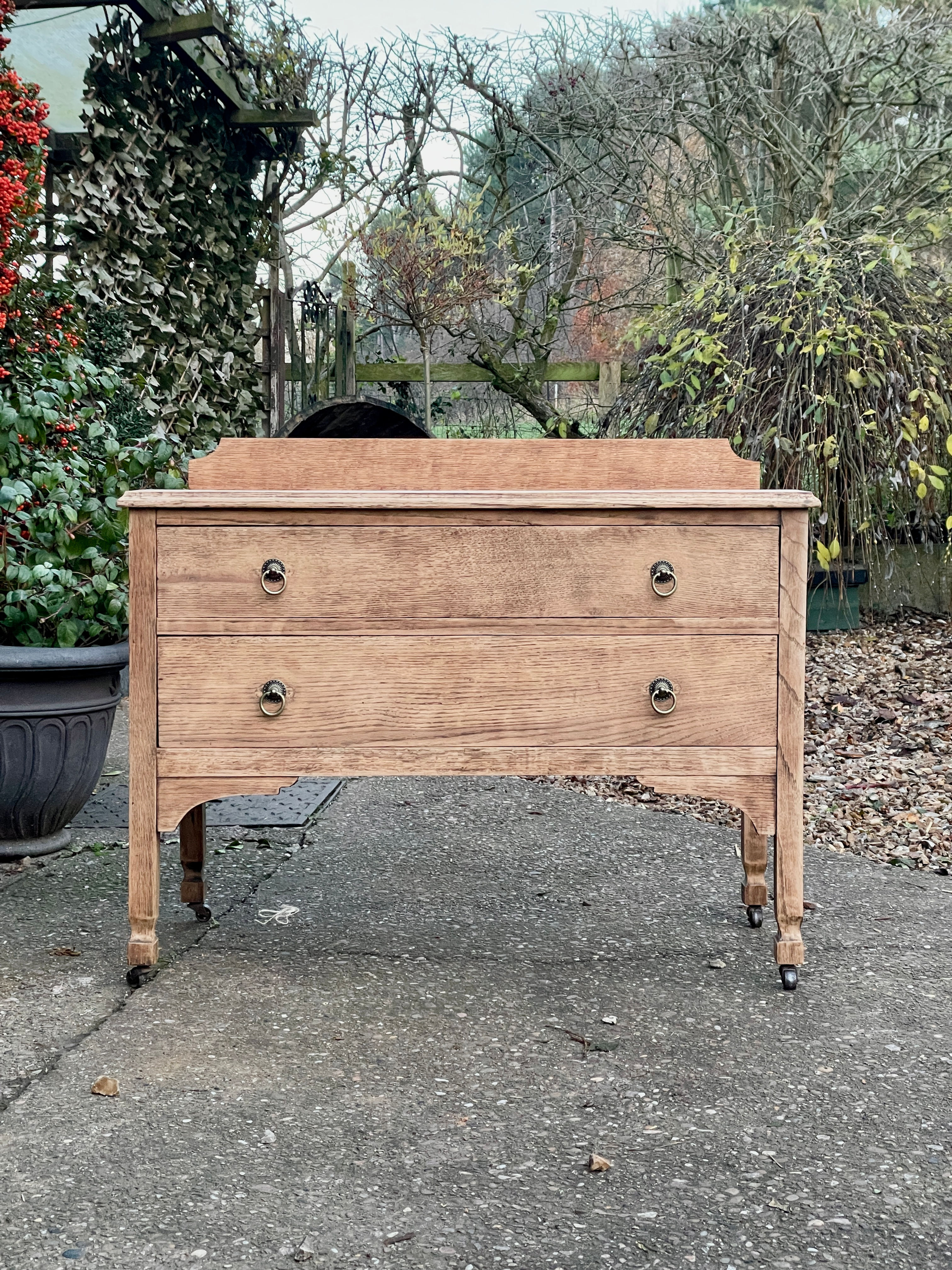 Vintage Oak Two-Drawer Chest with Original Castors