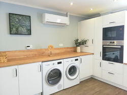 laundry corner with washer and dryer