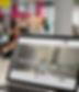 macbook-mockup-template-at-a-crowded-cafeteria-a4640.png
