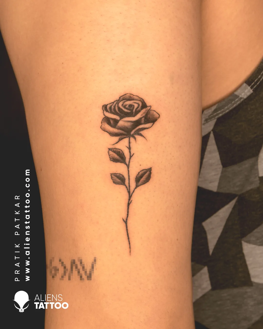small rose tattoo
