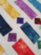 colourful strip design quilt white background