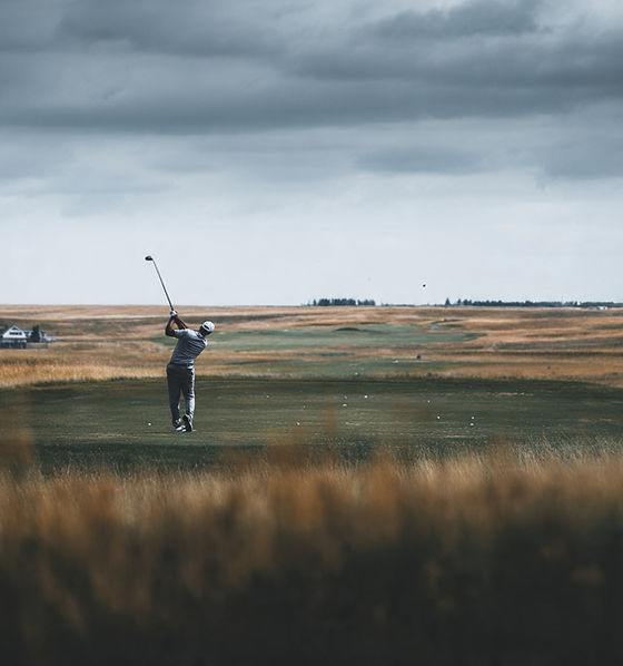 a-cinematic-shot-of-a-golfer-taking-a-long-distanc.jpeg