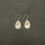 Thumbnail: Large Oval Shiva Shell Earrings