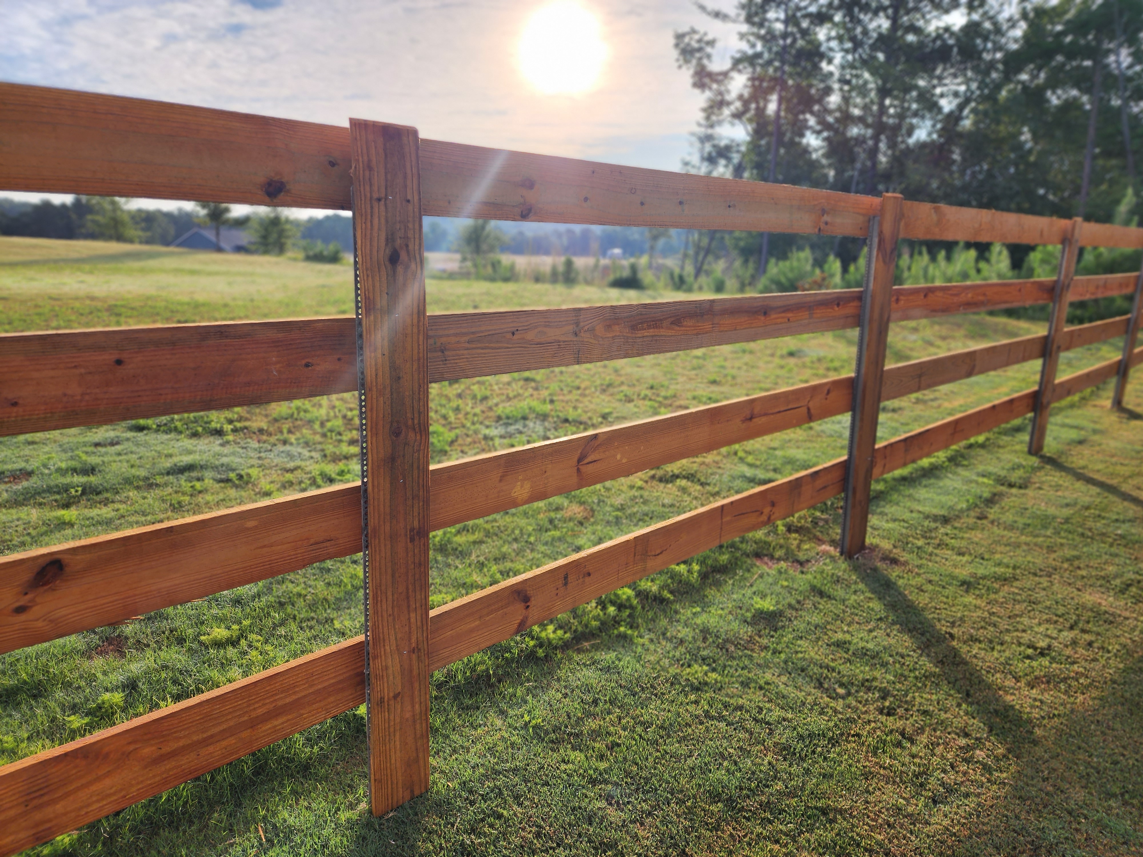Four rail wood corral fence in Canton Georgia
