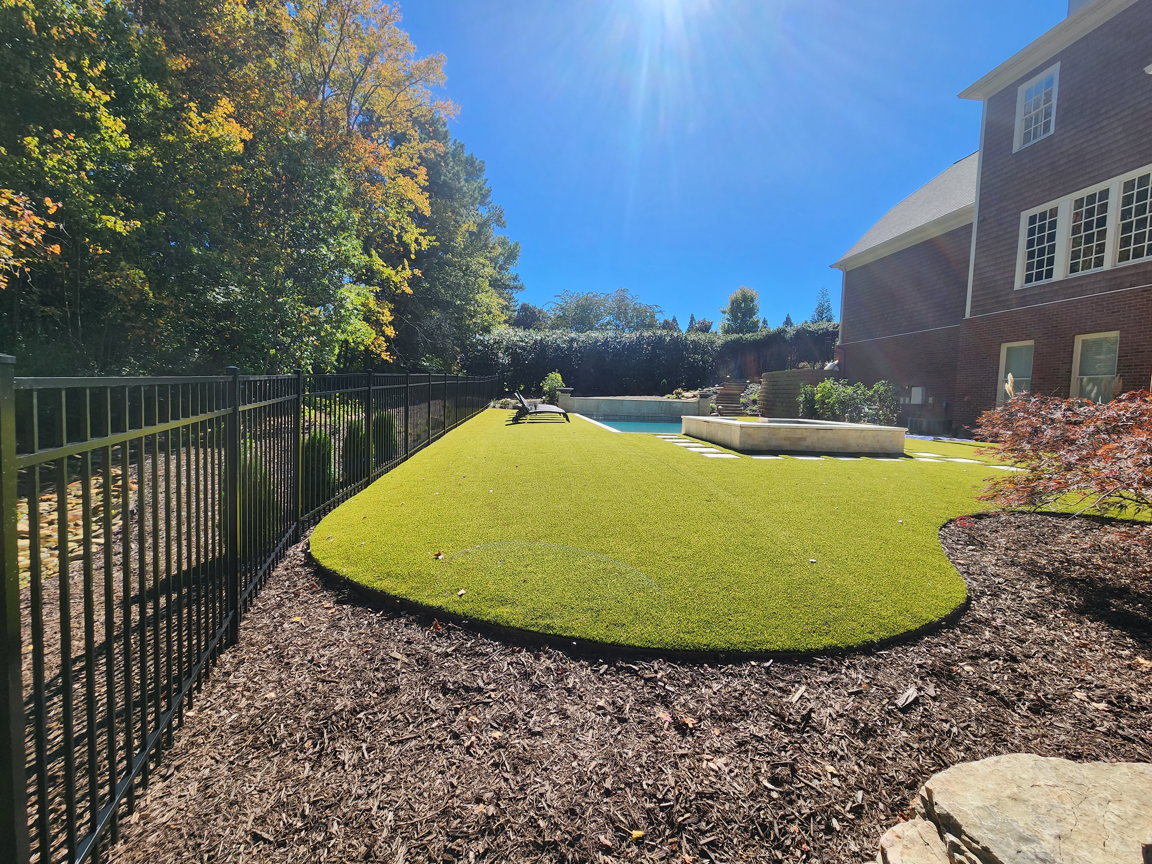 Three rail flat top aluminum pool fence in Roswell Georgia