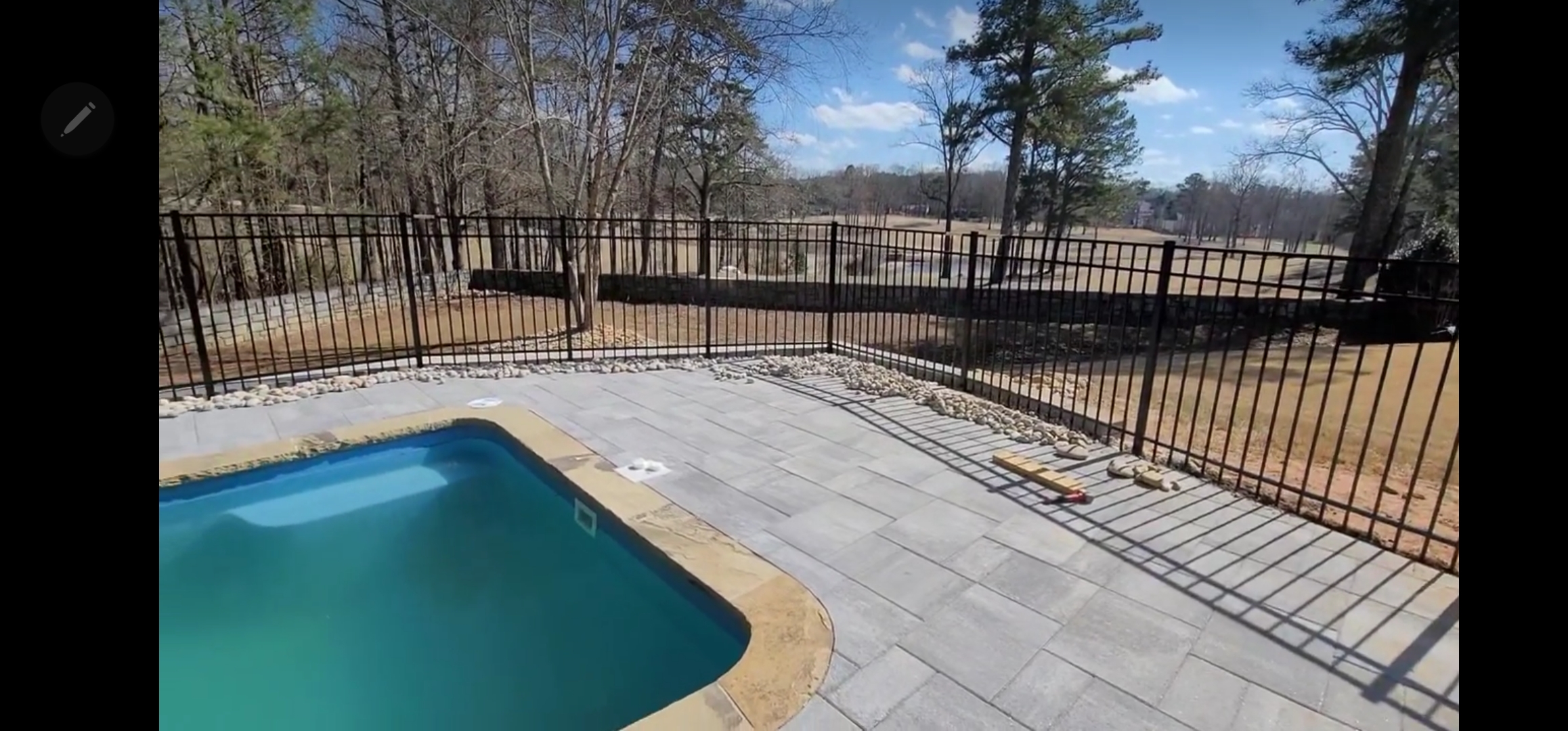 Three rail flat top rake bottom aluminum fence in Gainesville Georgia